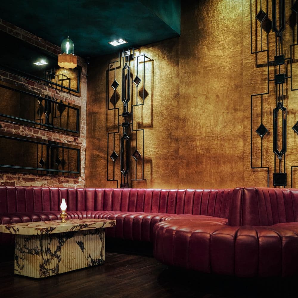 A warm café table set for an evening reservation